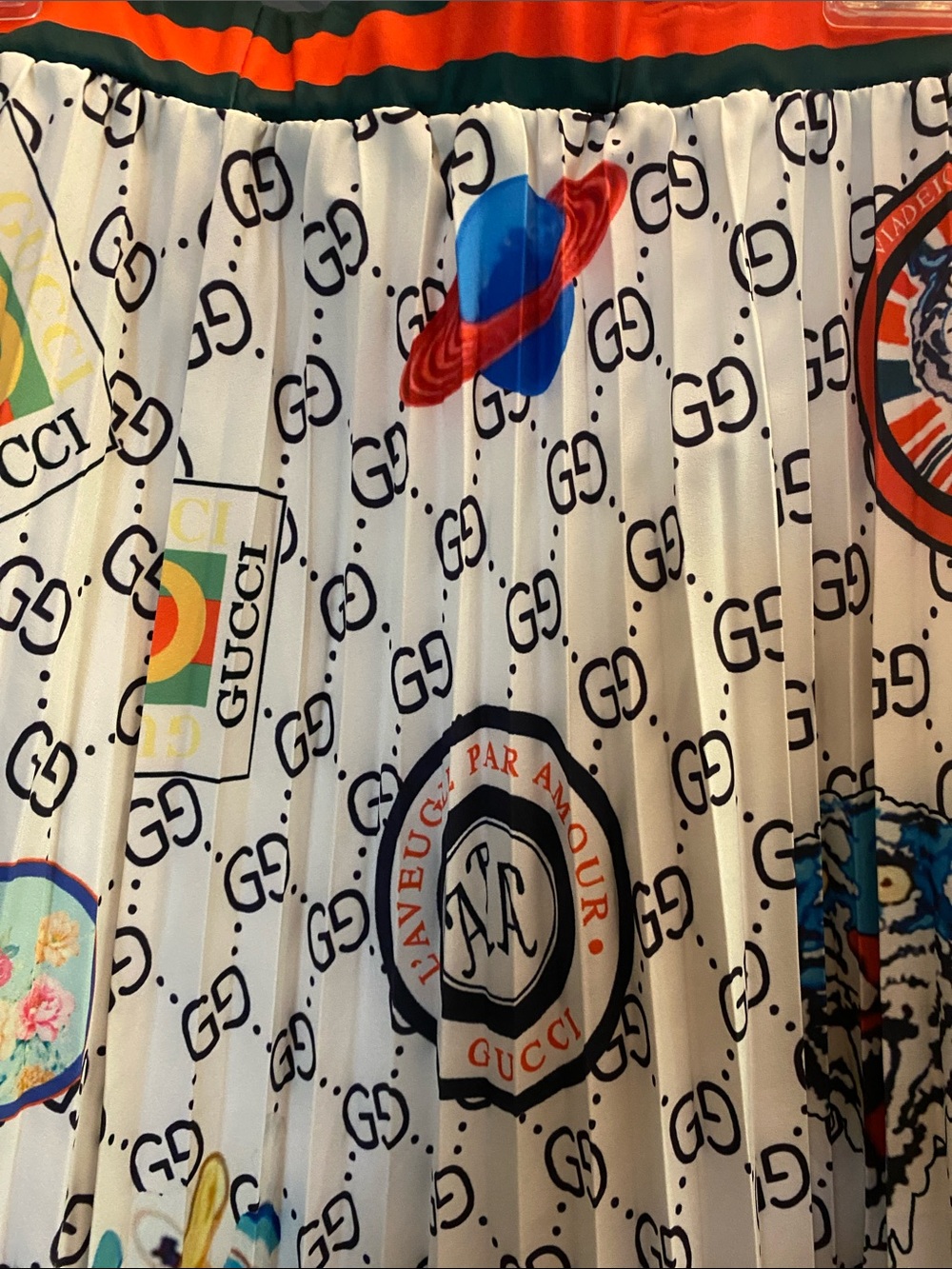 NWOT, Inspired Pleated Logo Print Skirt - White with Multicolor Patches
